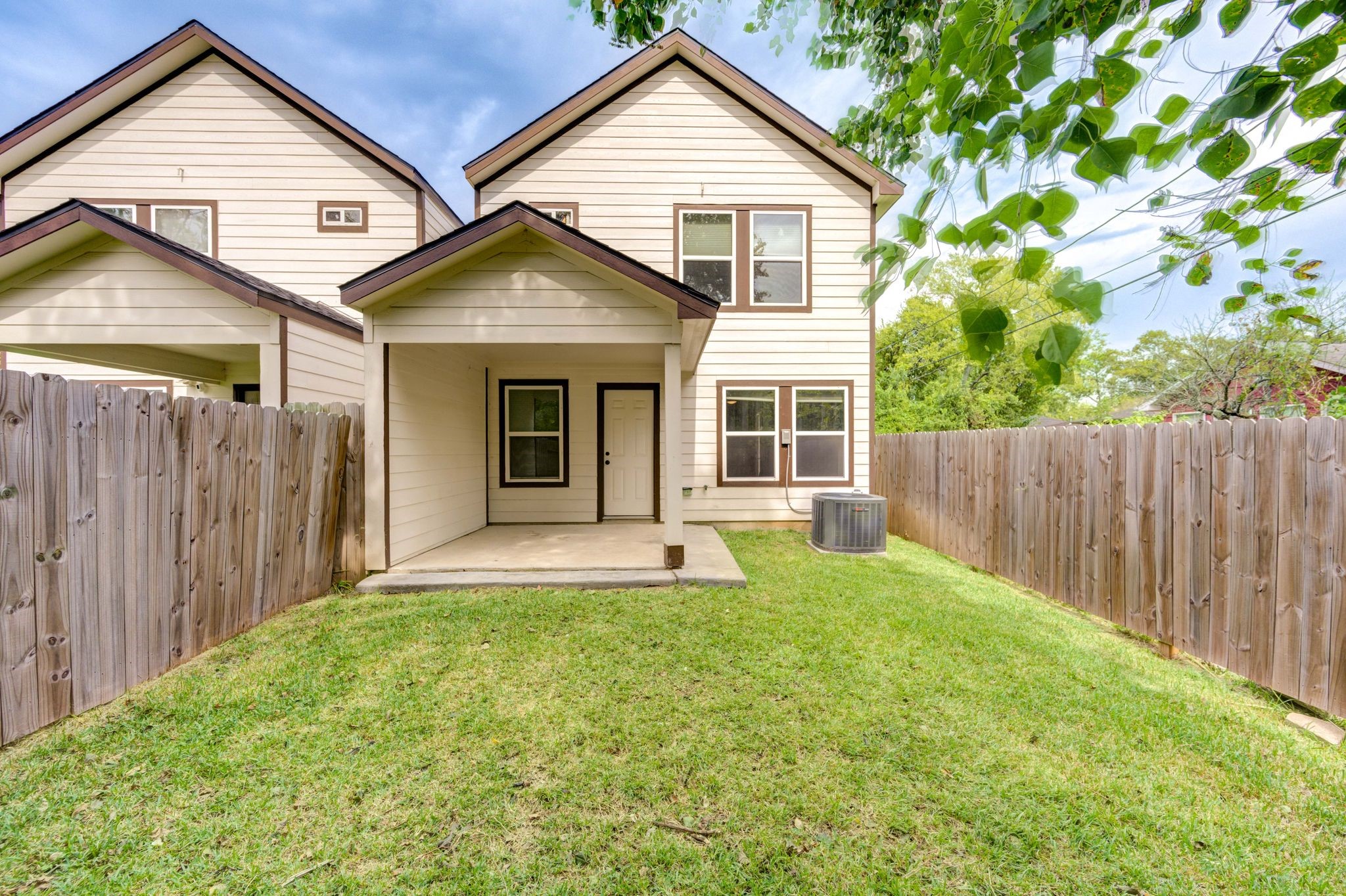 436 Owens Street Houston, TX 77029 - Photo 33 of 33 a view of a white house next to a yard with wooden fence