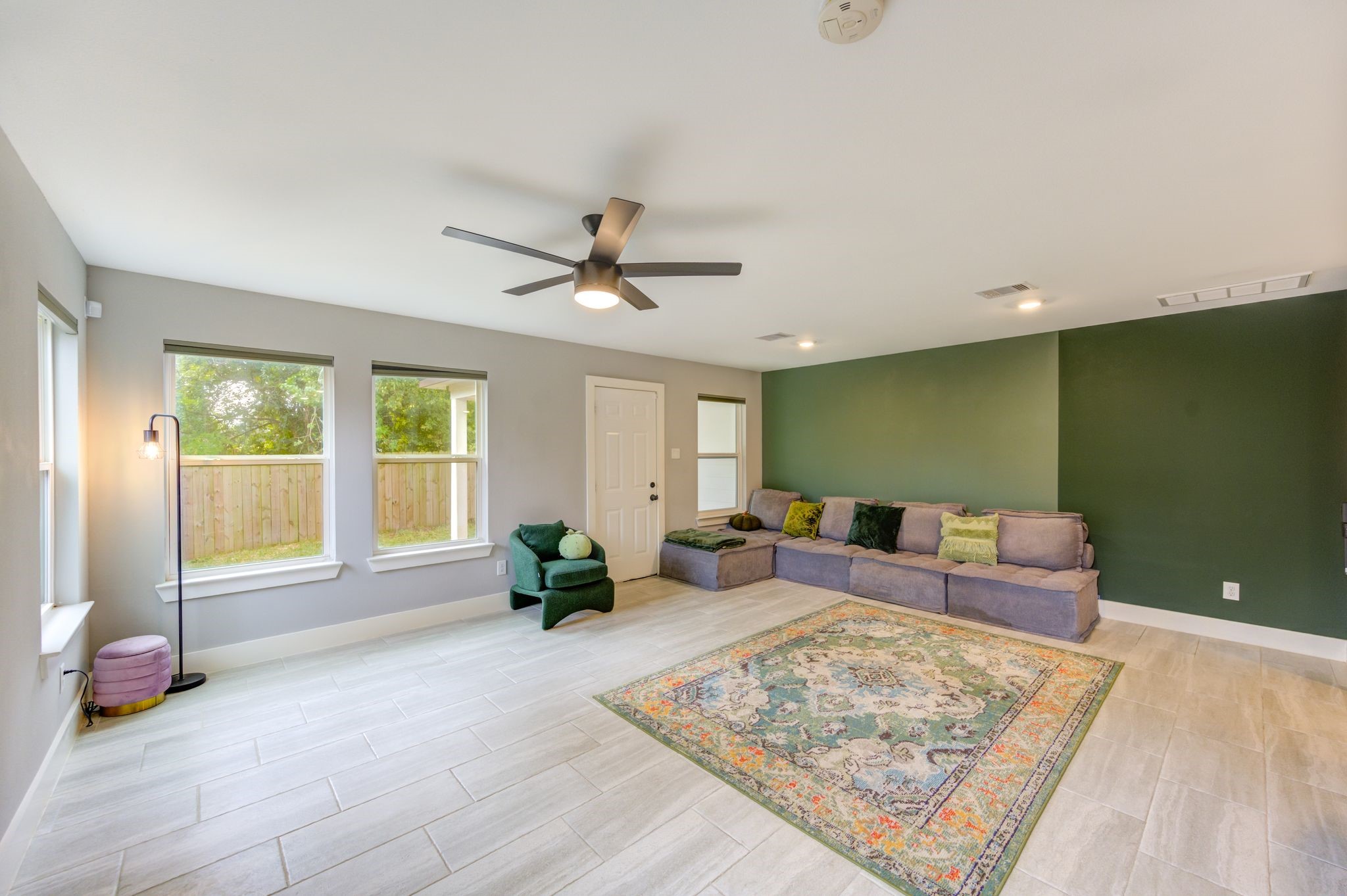 436 Owens Street Houston, TX 77029 - Photo 4 of 33 a living room with furniture and a large window