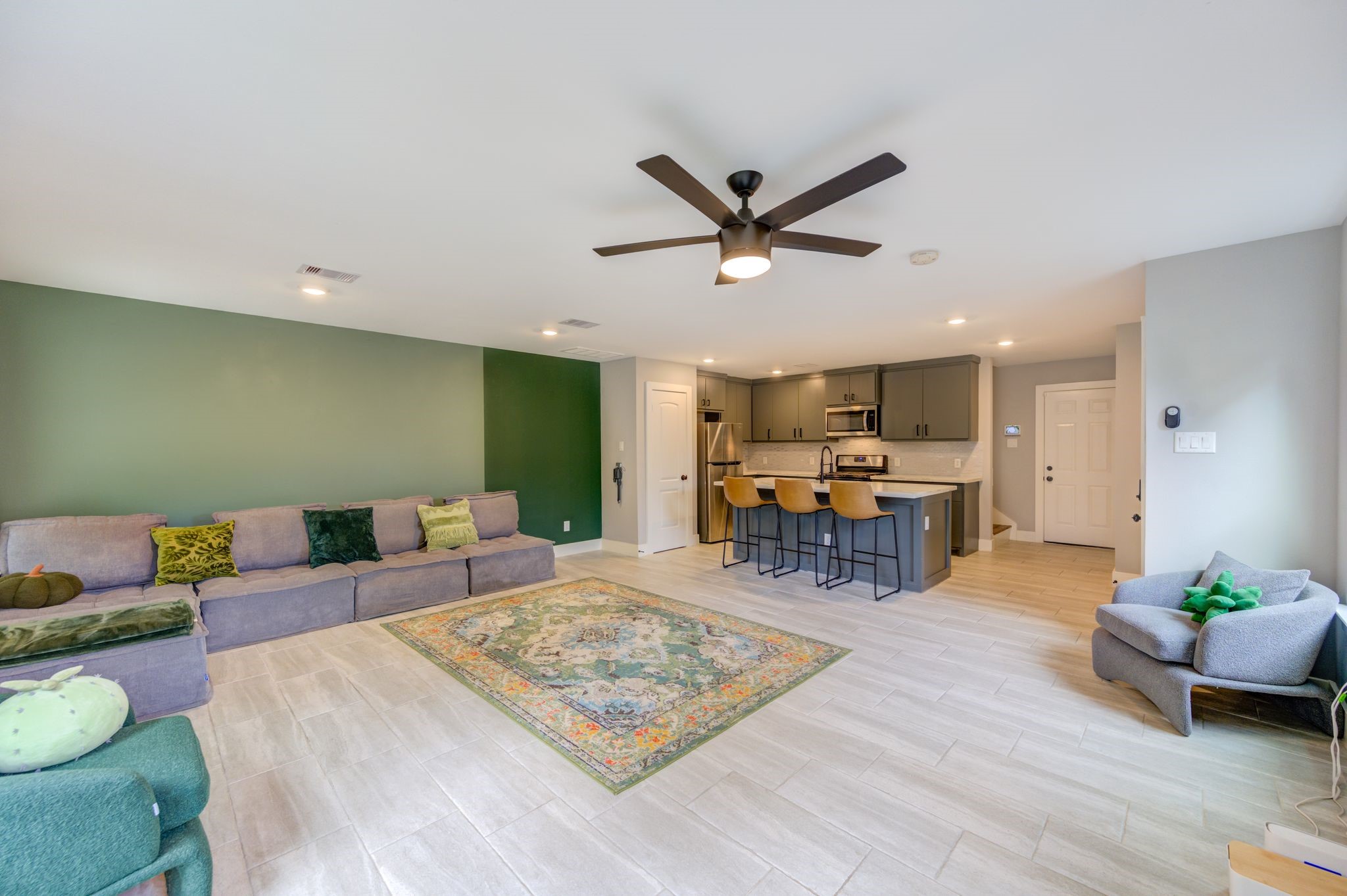 436 Owens Street Houston, TX 77029 - Photo 5 of 33 a living room with furniture and wooden floor