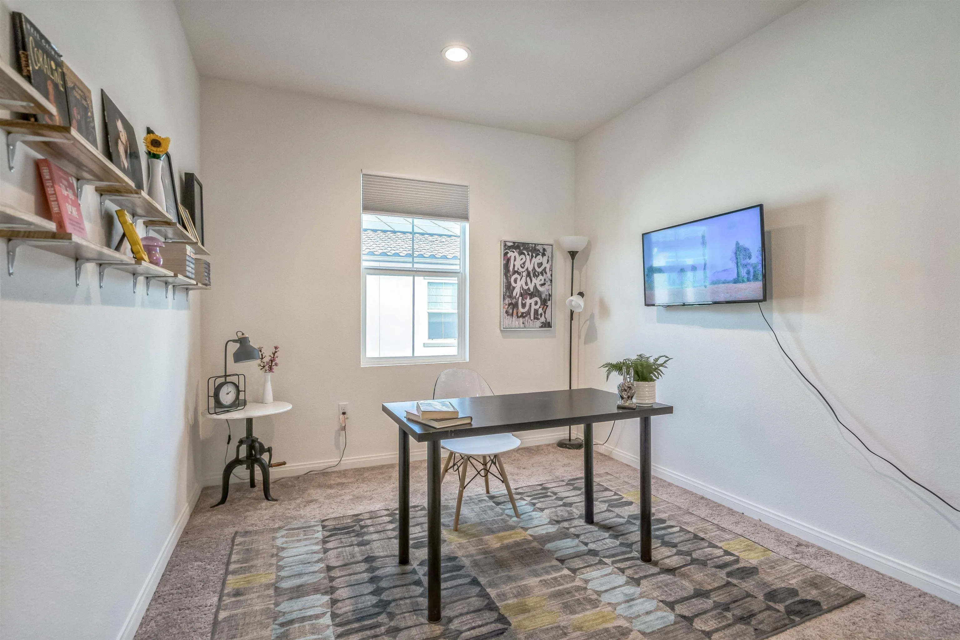 2018 Barite Street Spring Valley, CA 91977 - Photo 17 of 47 a workspace with furniture and a window