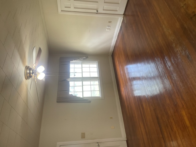 12610 Pecan School Road Bartlett, TX 76511 - Photo 10 of 21 Rich hardwood flooring reflects natural light in this inviting, versatile room.