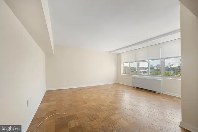 a kitchen with a refrigerator stove and sink