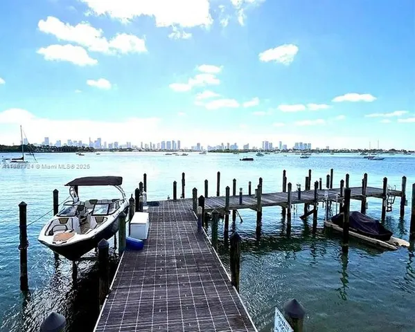 a view of swimming pool with a yard