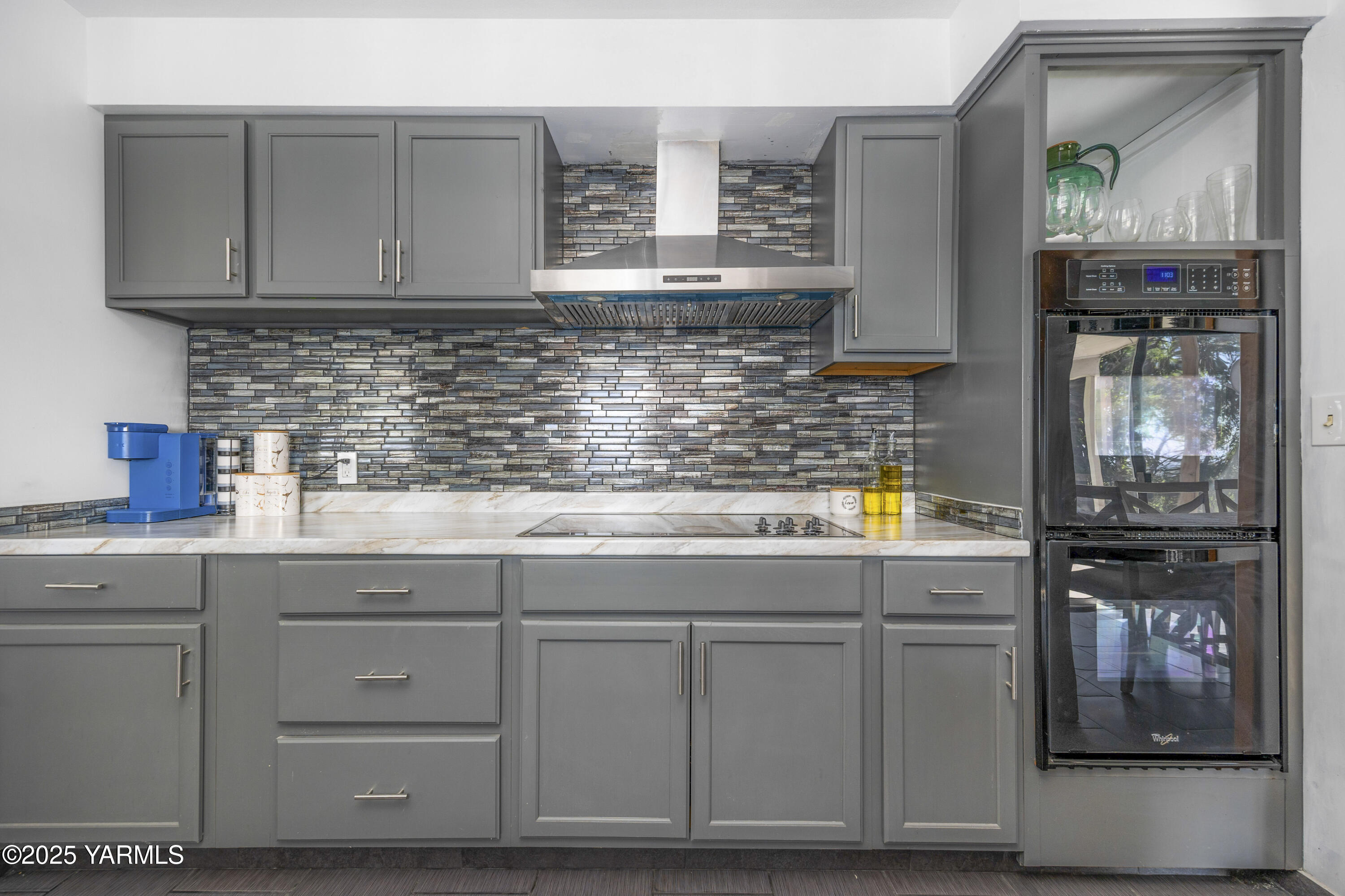 1381 West Riverside Avenue Sunnyside, WA 98944 - Photo 12 of 53 a kitchen with appliances cabinets and a counter top space