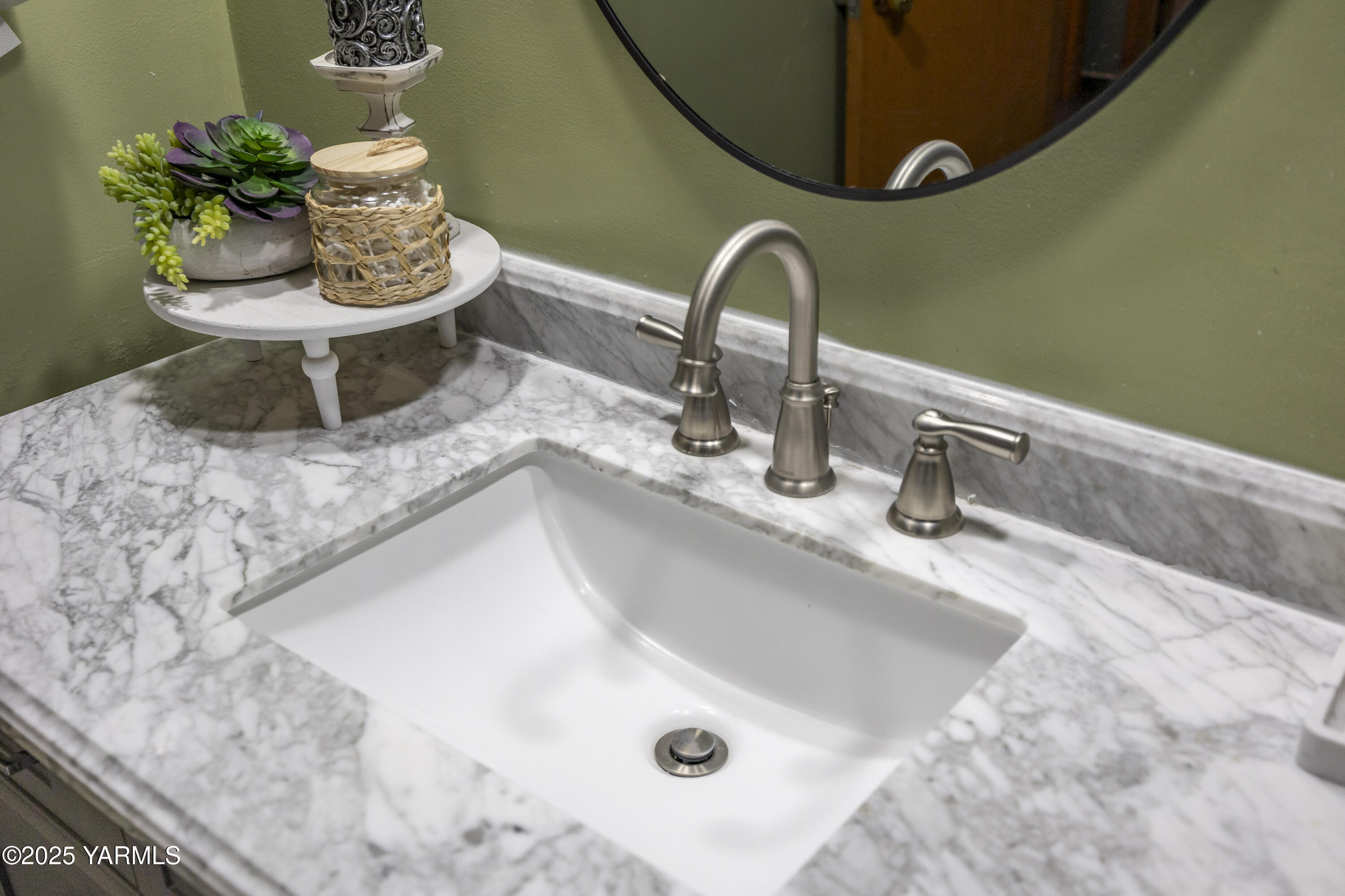 1381 West Riverside Avenue Sunnyside, WA 98944 - Photo 25 of 53 a bathroom with a sink and a mirror