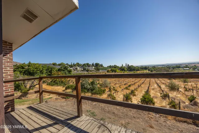 a view of city from a balcony