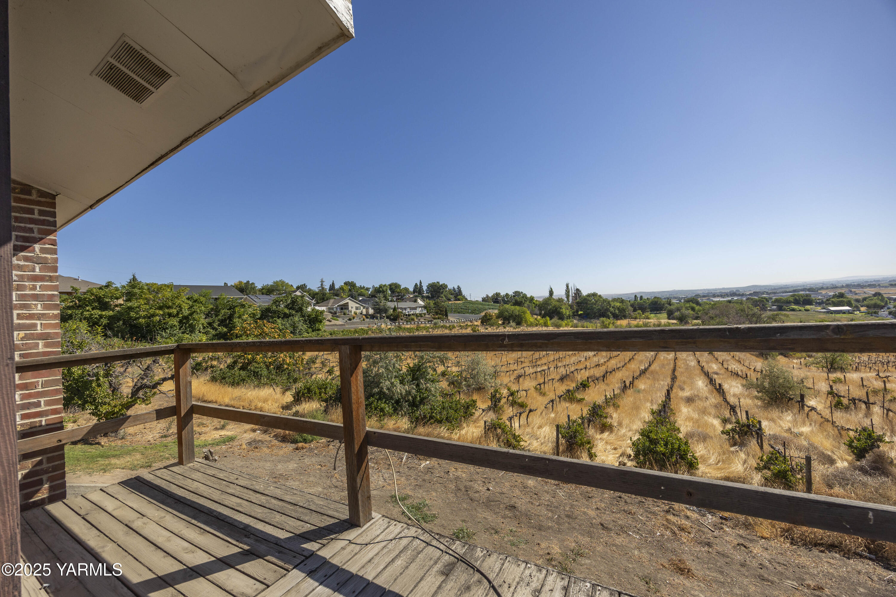 1381 West Riverside Avenue Sunnyside, WA 98944 - Photo 3 of 53 a view of city from a balcony