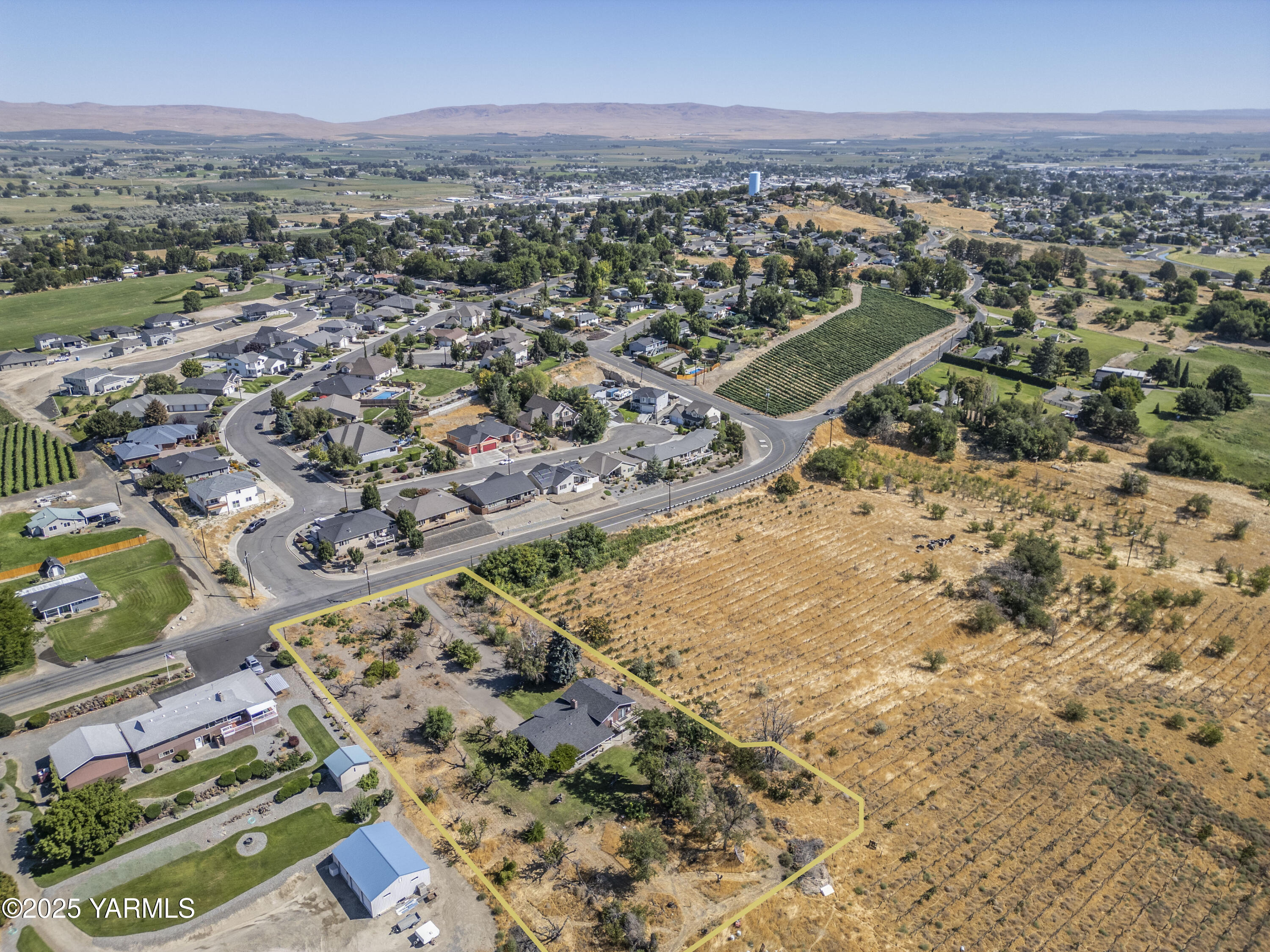 1381 West Riverside Avenue Sunnyside, WA 98944 - Photo 4 of 53 an aerial view of a city