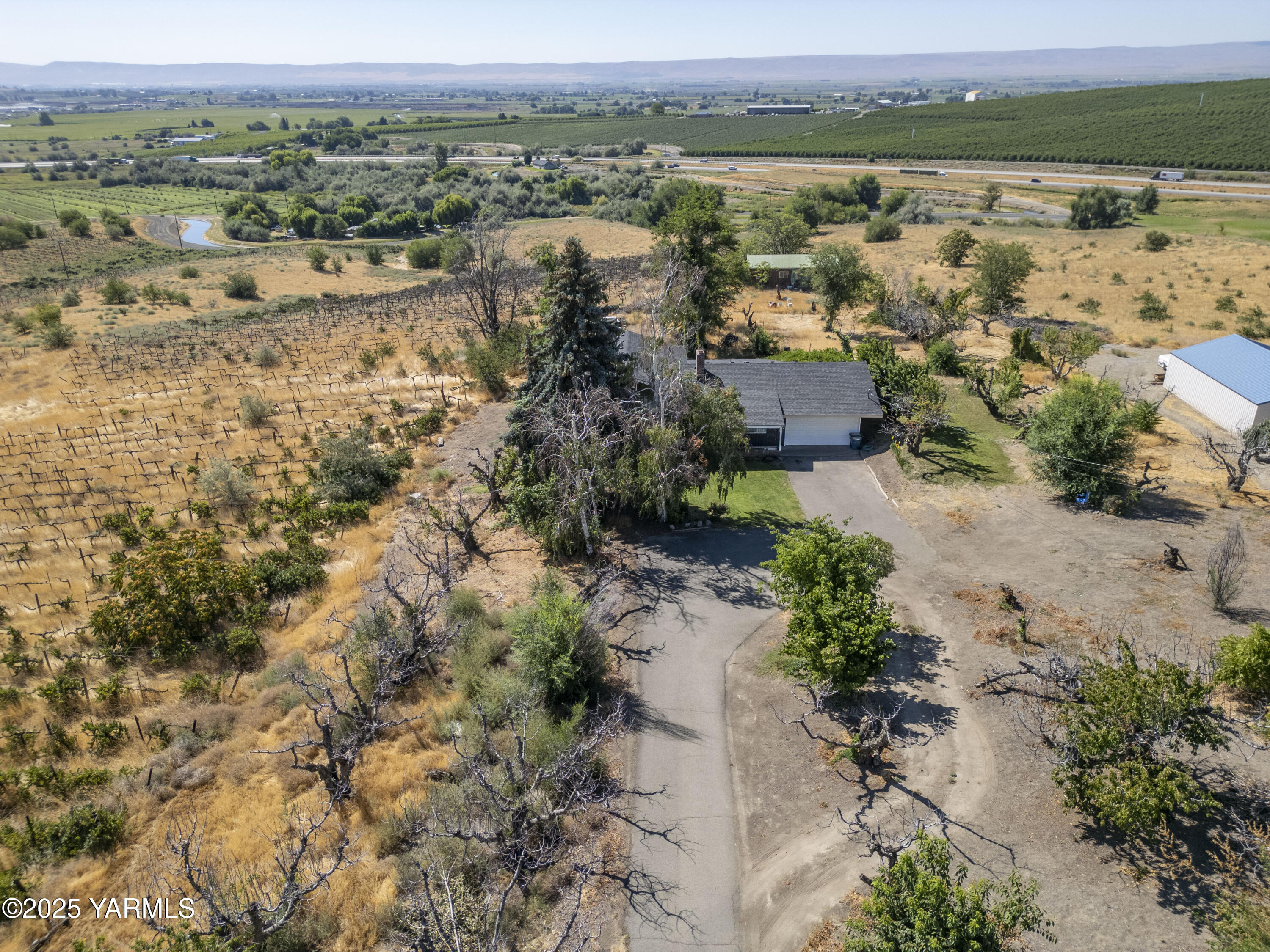1381 West Riverside Avenue Sunnyside, WA 98944 - Photo 41 of 53 an aerial view of a house with a outdoor space