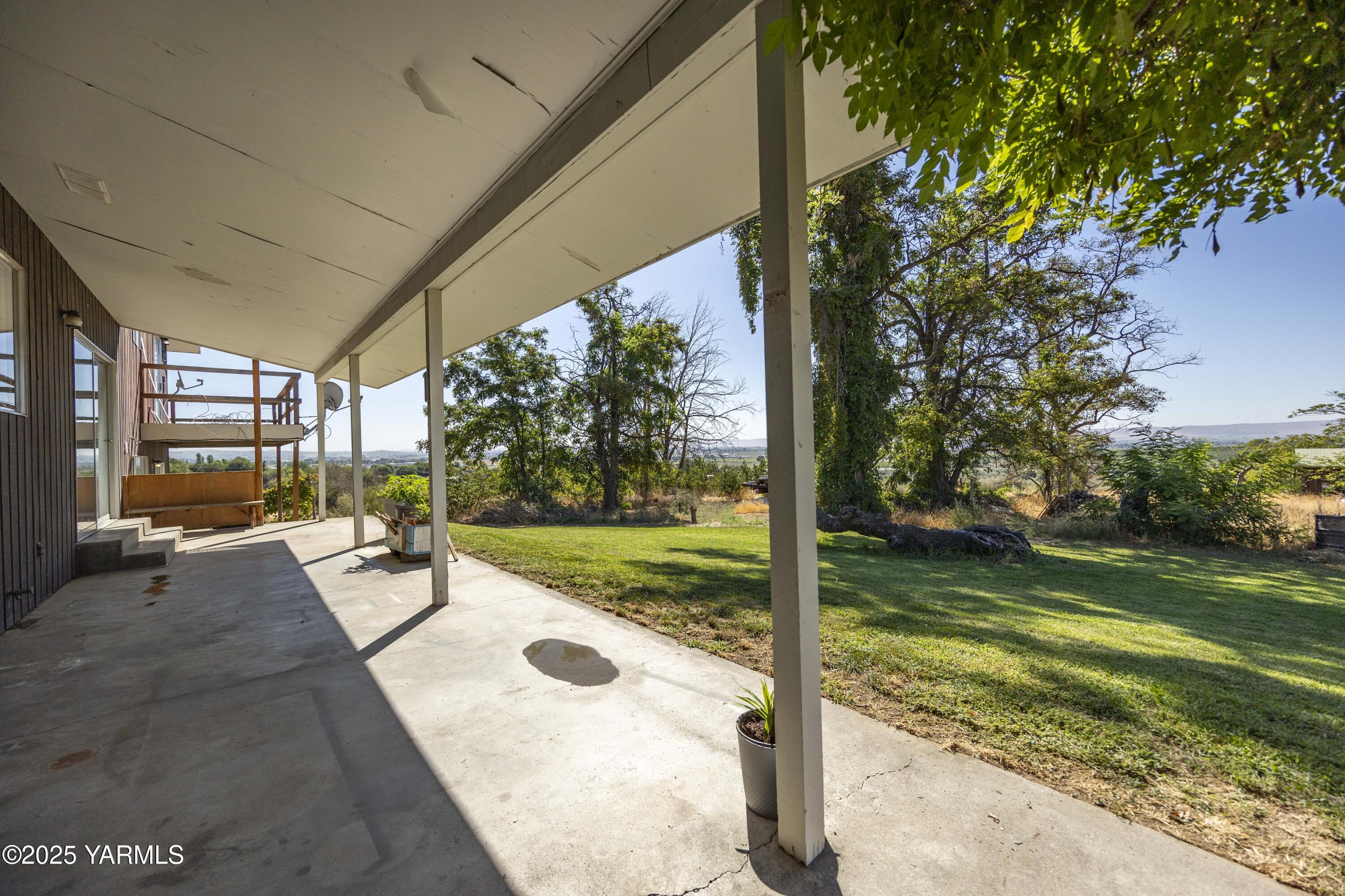 1381 West Riverside Avenue Sunnyside, WA 98944 - Photo 45 of 53 a view of a house with backyard porch and garden