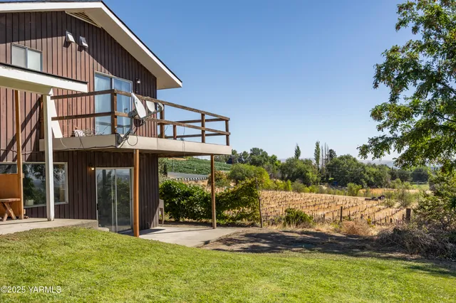 a view of a flower pot with wooden floor