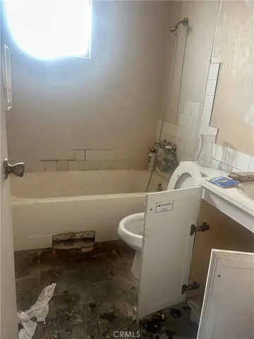 a house view with a backyard space