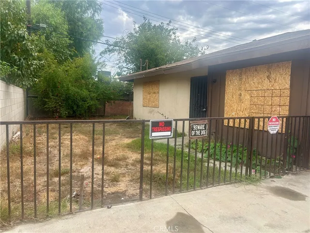 a view of a swimming pool and lounge chair
