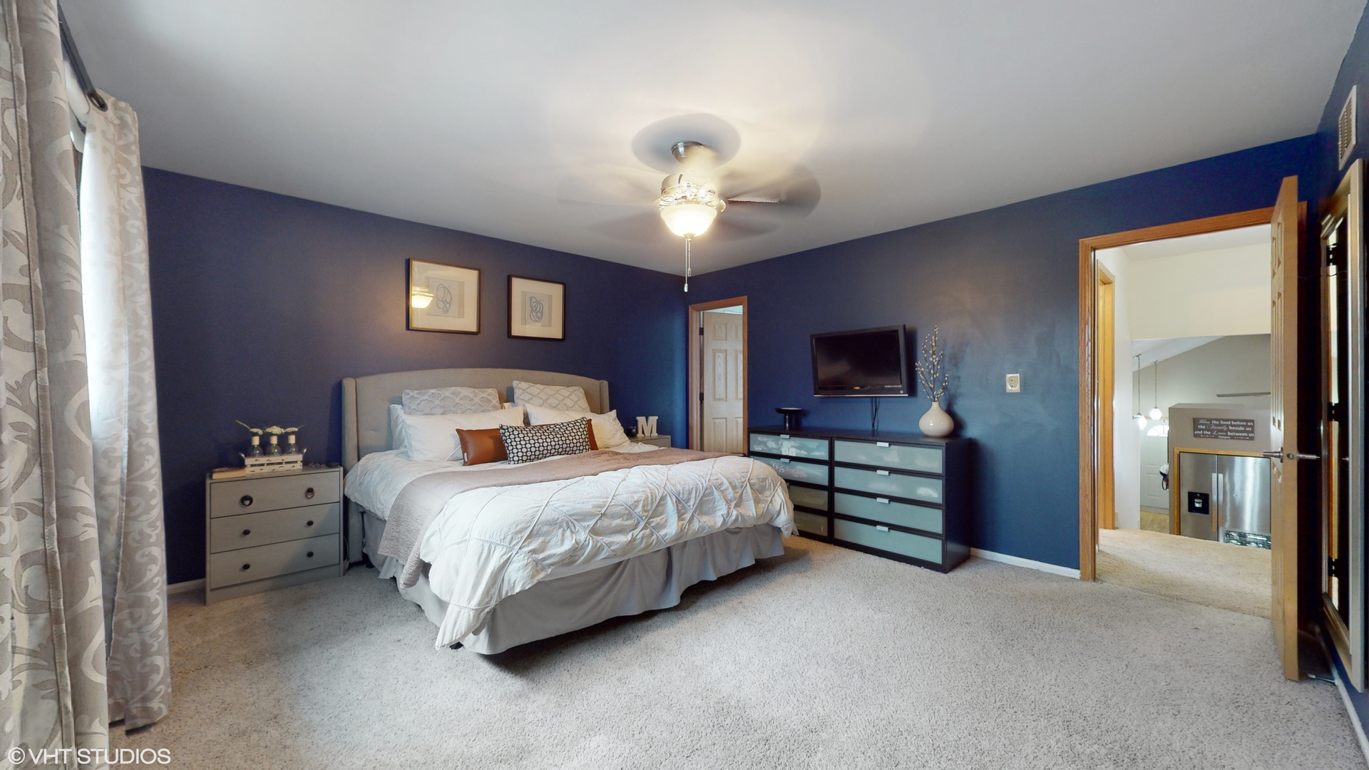 5054 Arrowhead Trace Oak Forest, IL 60452 - Photo 11 of 27 a bedroom with bed and a chandelier