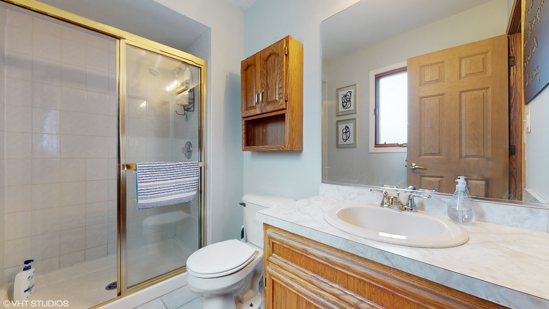 5054 Arrowhead Trace Oak Forest, IL 60452 - Photo 12 of 27 a bathroom with a sink toilet and shower
