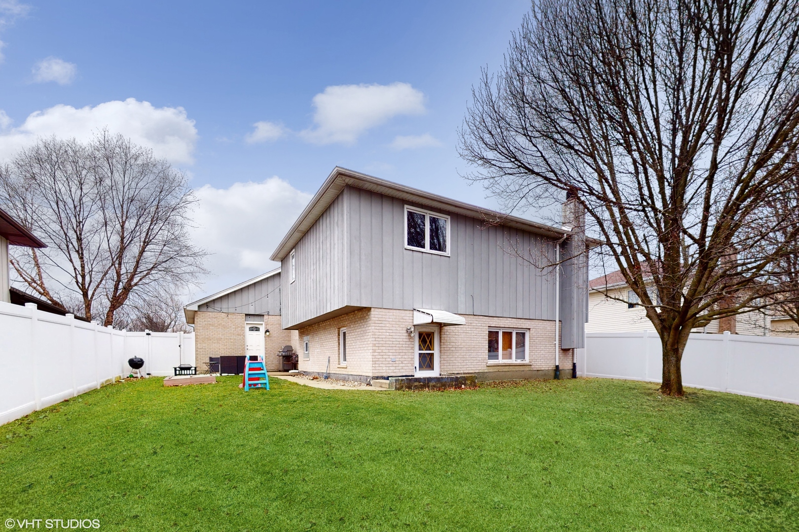 5054 Arrowhead Trace Oak Forest, IL 60452 - Photo 24 of 27 a view of a house with backyard