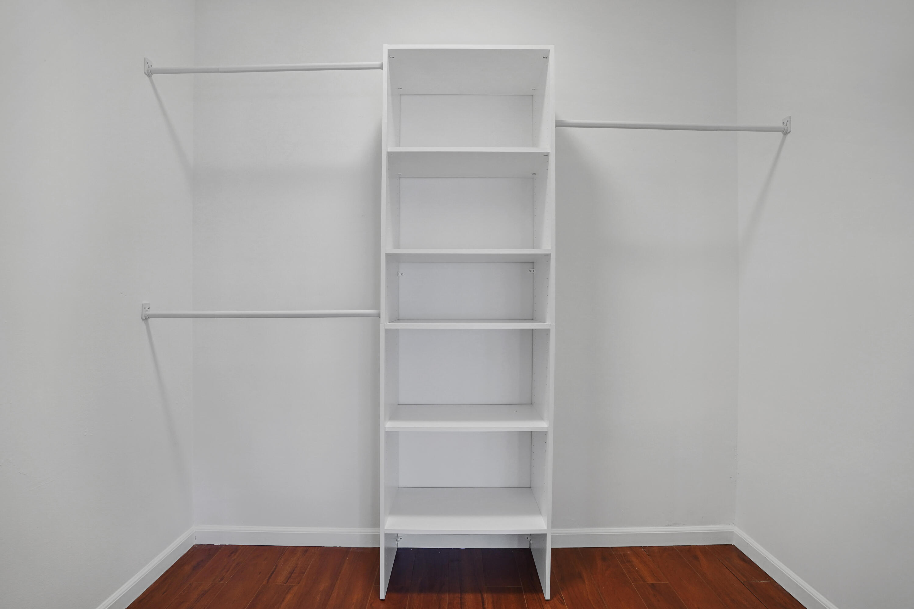 6513 Via Regina Boca Raton, FL 33433 - Photo 20 of 30 a view of walk in closet with empty racks