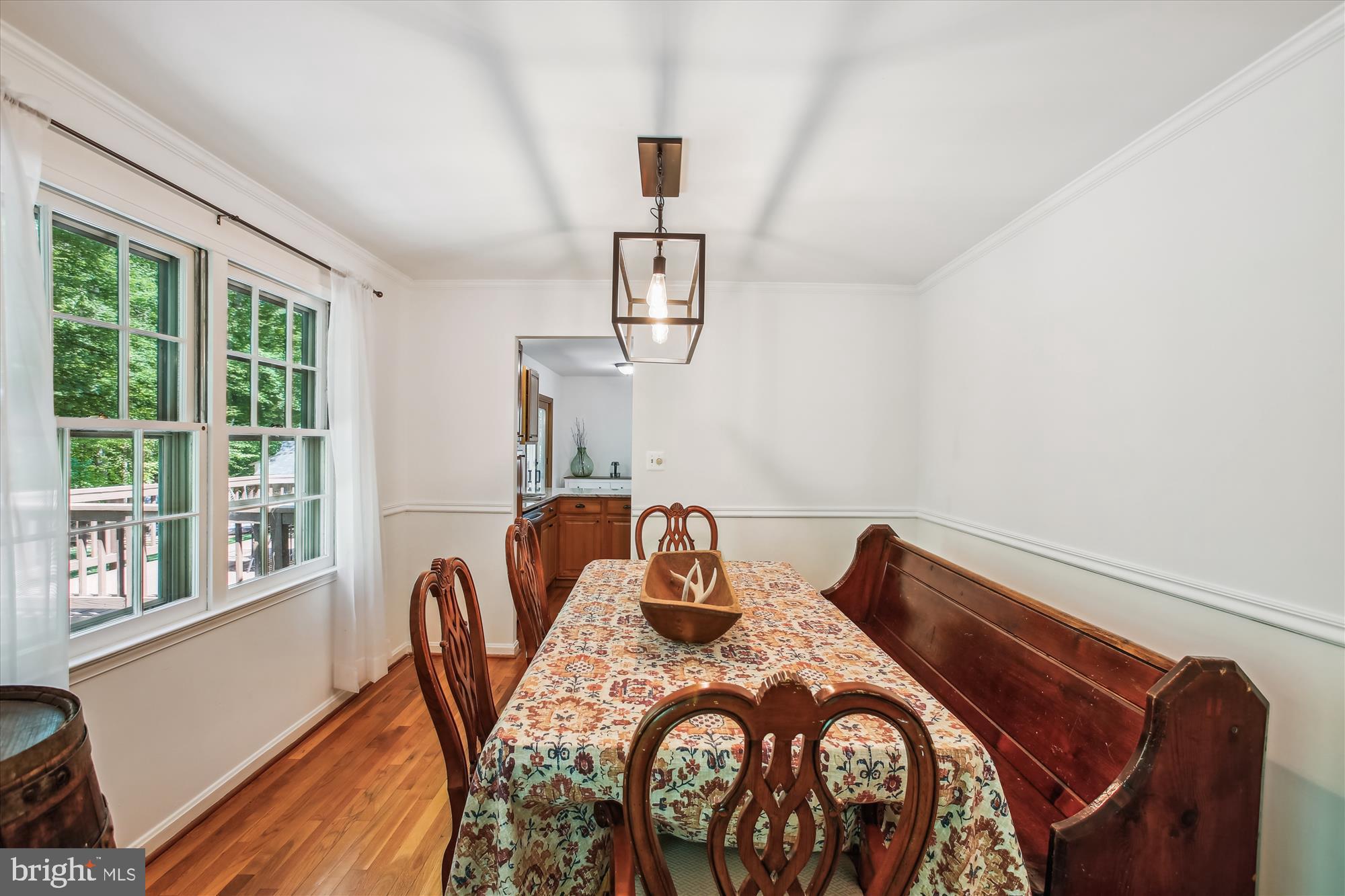 6961 Conservation Drive Springfield, VA 22153 - Photo 16 of 62 a view of a dining room with furniture window and outside view