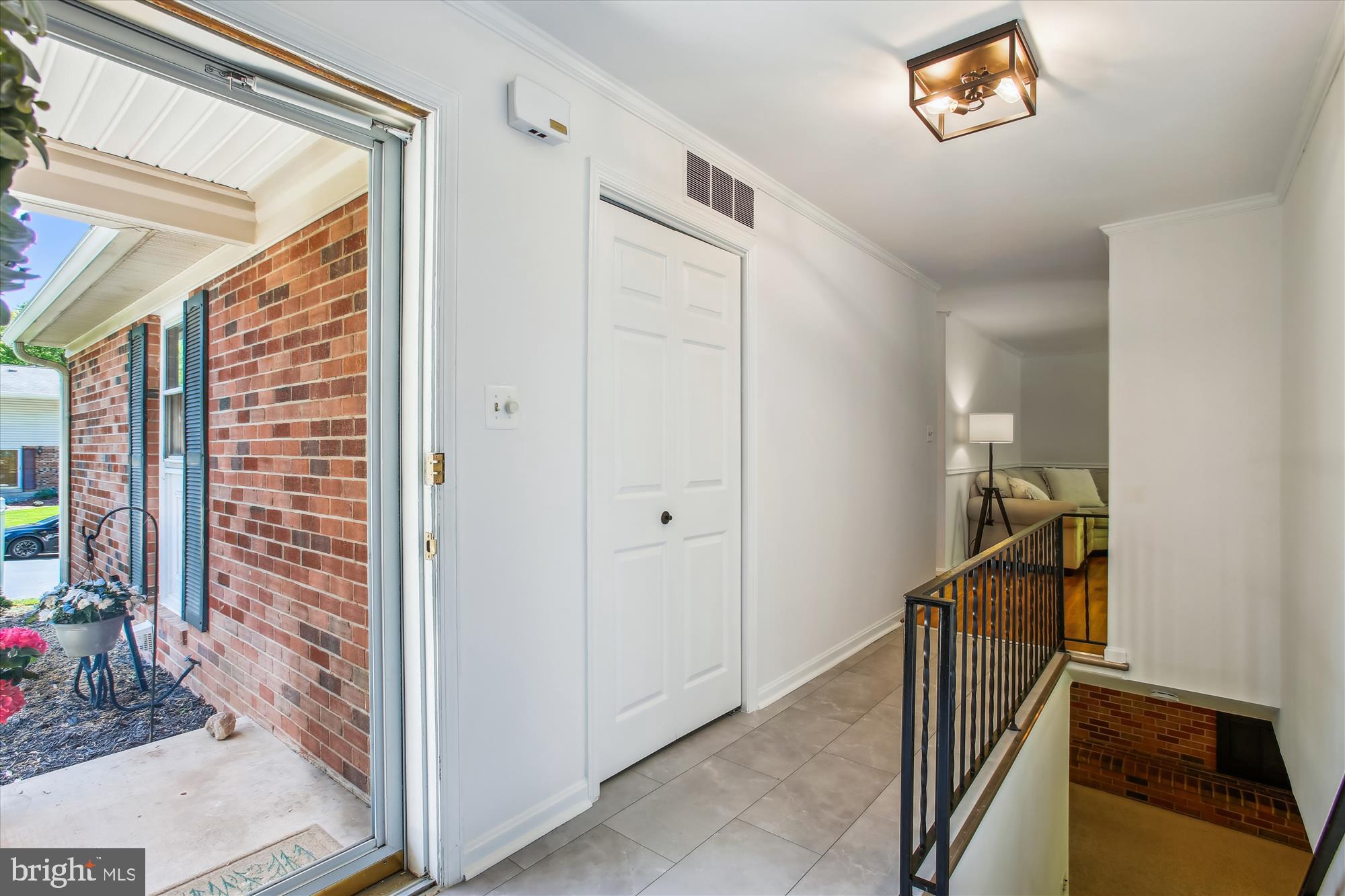 6961 Conservation Drive Springfield, VA 22153 - Photo 17 of 62 a view of a hallway with a entryway