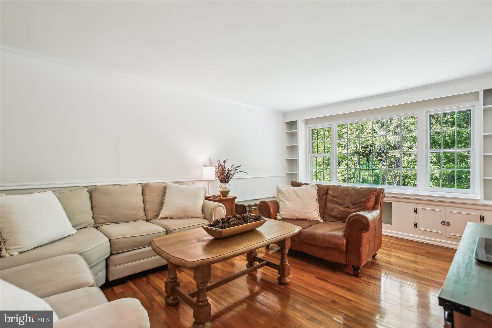 6961 Conservation Drive Springfield, VA 22153 - Photo 20 of 62 a living room with furniture and a large window