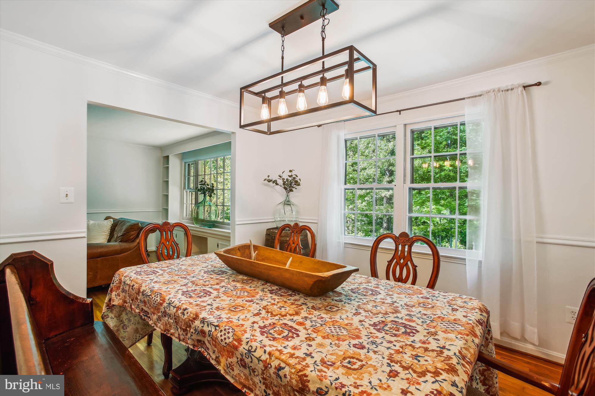 6961 Conservation Drive Springfield, VA 22153 - Photo 24 of 62 a bedroom with a bed a table and chair
