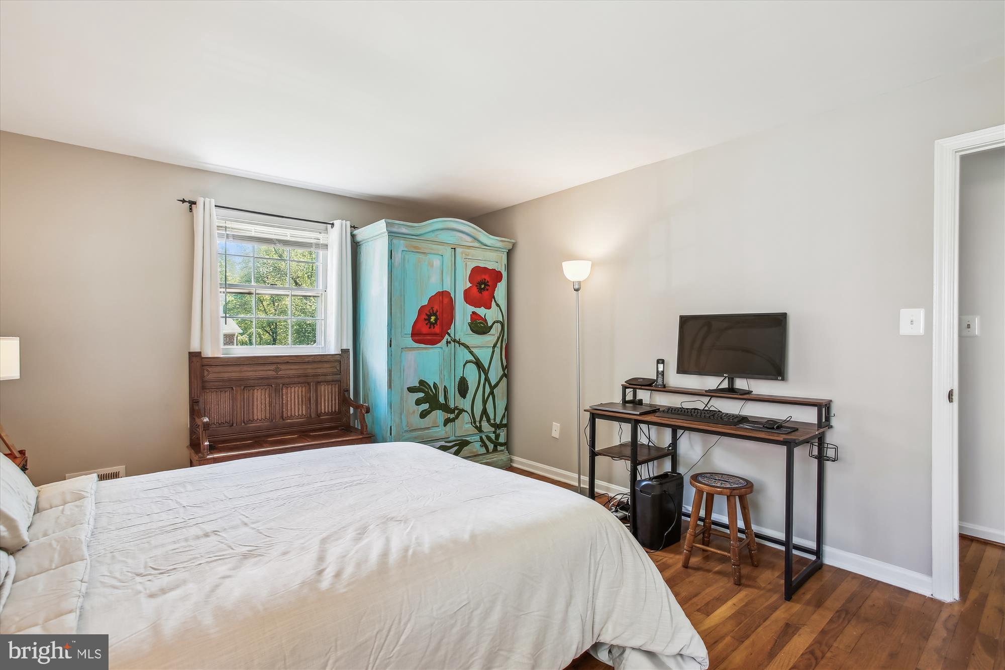 6961 Conservation Drive Springfield, VA 22153 - Photo 30 of 62 a bedroom with a bed and a window