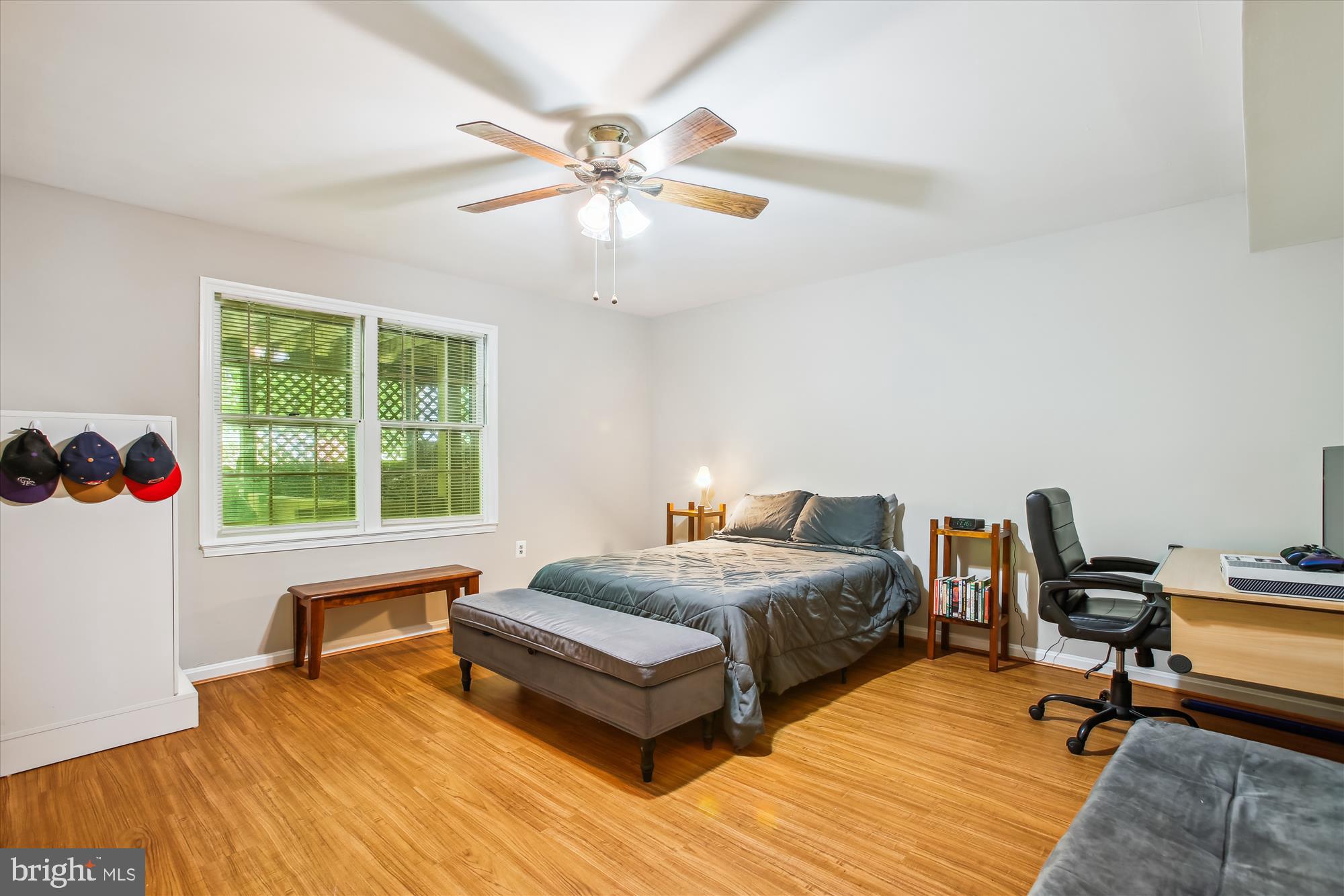6961 Conservation Drive Springfield, VA 22153 - Photo 36 of 62 a bedroom with a bed and a window