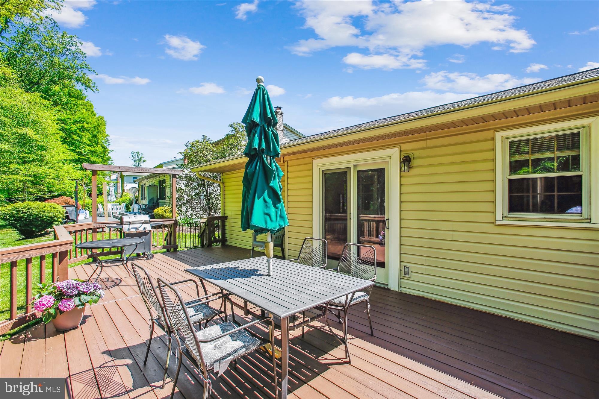 6961 Conservation Drive Springfield, VA 22153 - Photo 45 of 62 a view of a backyard with sitting area