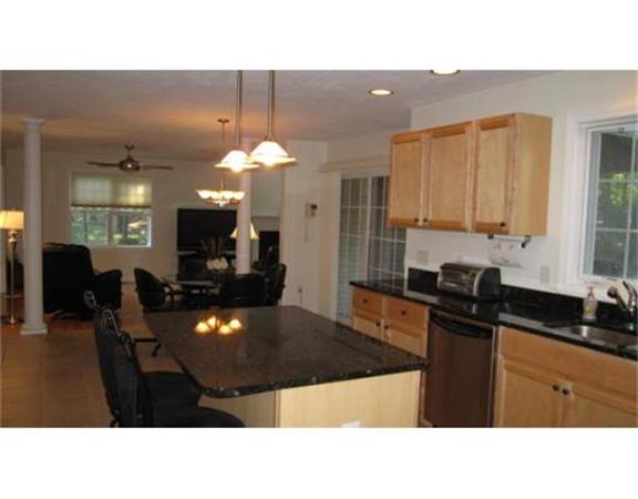 45 Tannery Road Sturbridge, MA 01518 - Photo 15 of 30 a kitchen with a sink a stove and cabinets