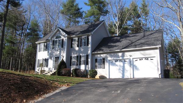 45 Tannery Road Sturbridge, MA 01518 - Photo 3 of 30 a front view of a house with a yard