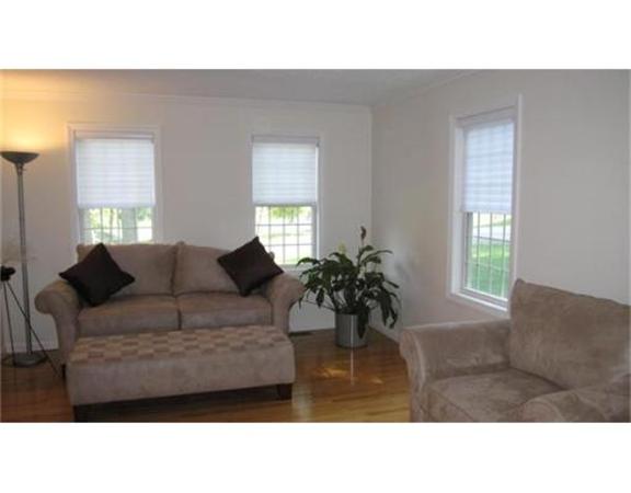 45 Tannery Road Sturbridge, MA 01518 - Photo 6 of 30 a living room with furniture and a large window