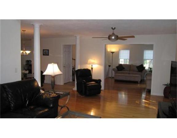 45 Tannery Road Sturbridge, MA 01518 - Photo 7 of 30 a living room with furniture and a lamp