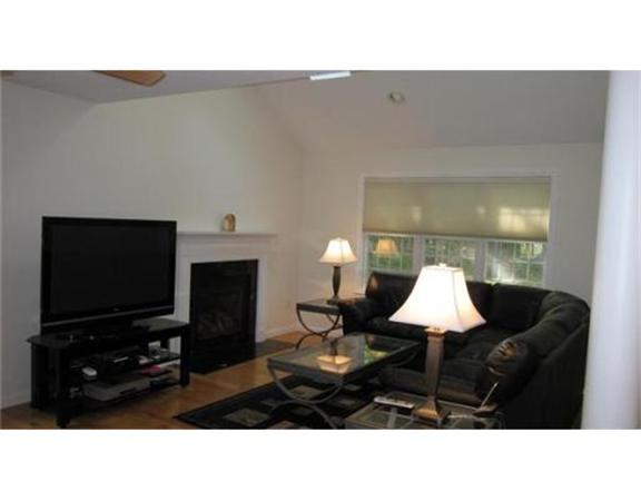 45 Tannery Road Sturbridge, MA 01518 - Photo 8 of 30 a living room with furniture and a flat screen tv