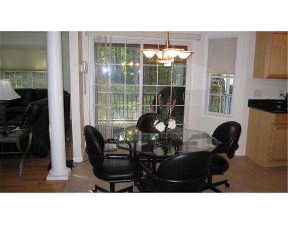 45 Tannery Road Sturbridge, MA 01518 - Photo 10 of 30 a living room with furniture and floor to ceiling window