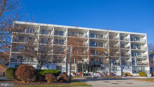a front view of a building with street view