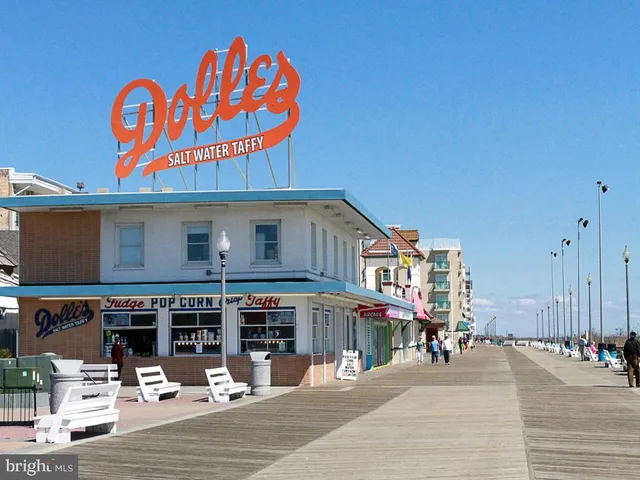a front view of a building with a yard