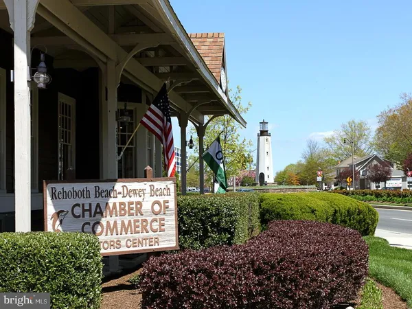 a view of a street with sign board