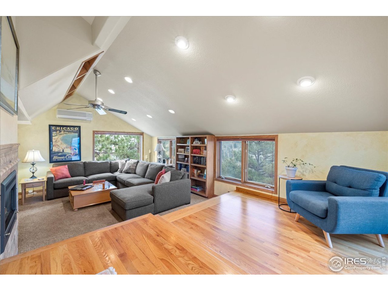 6293 Red Hill Road Boulder, CO 80302 - Photo 11 of 40 a living room with furniture and a flat screen tv
