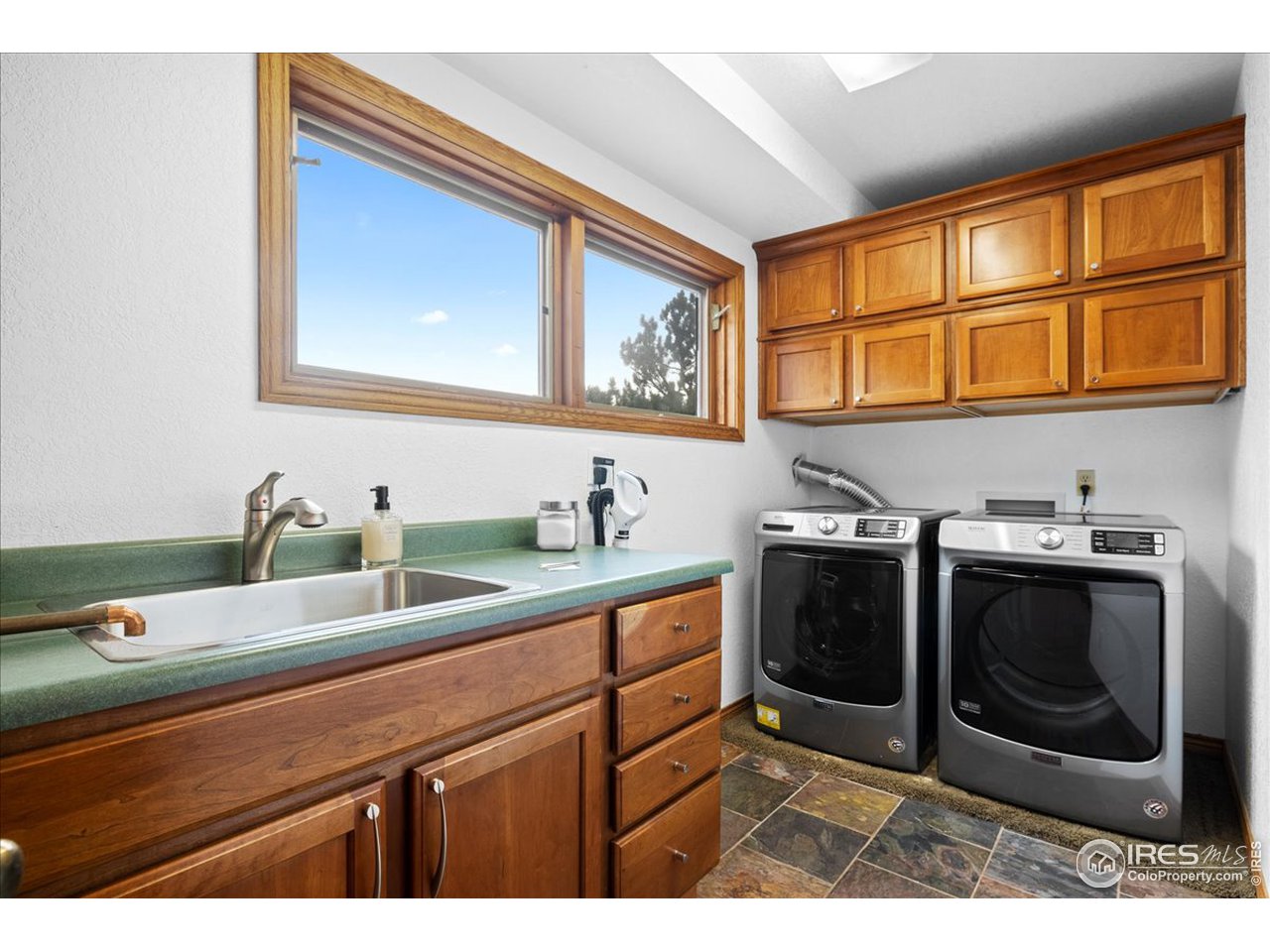 6293 Red Hill Road Boulder, CO 80302 - Photo 13 of 40 a bathroom with a sink and a washing machine