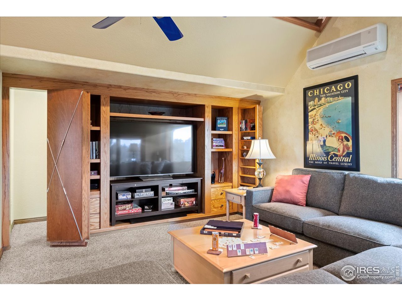 6293 Red Hill Road Boulder, CO 80302 - Photo 14 of 40 a living room with furniture and a flat screen tv