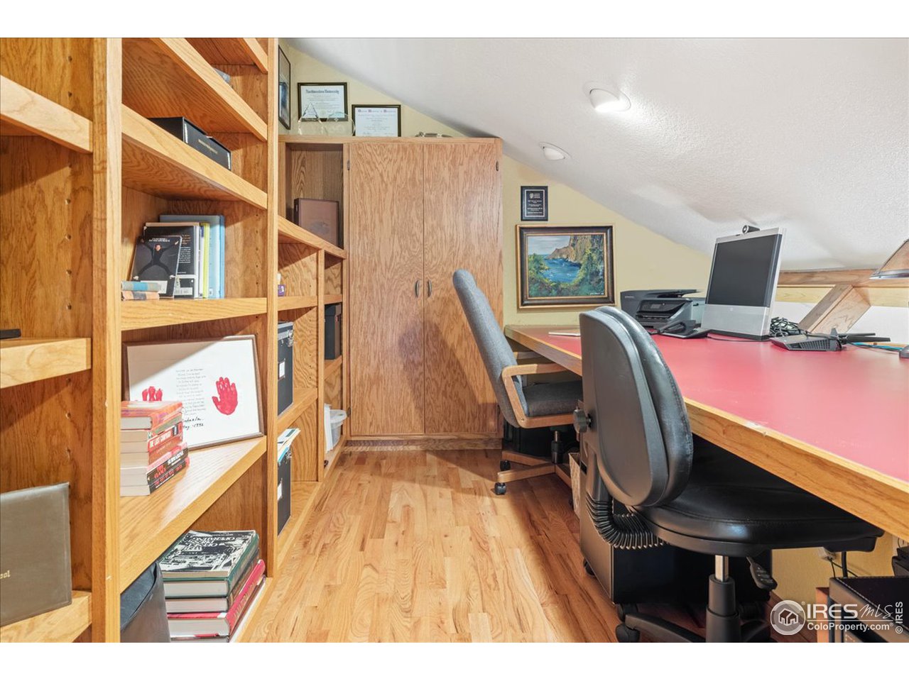 6293 Red Hill Road Boulder, CO 80302 - Photo 15 of 40 a view of a workspace with furniture and wooden floor