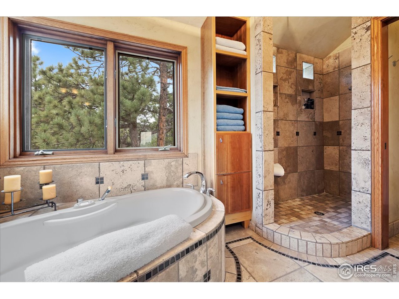 6293 Red Hill Road Boulder, CO 80302 - Photo 20 of 40 a bathroom with a granite countertop sink and a bathtub
