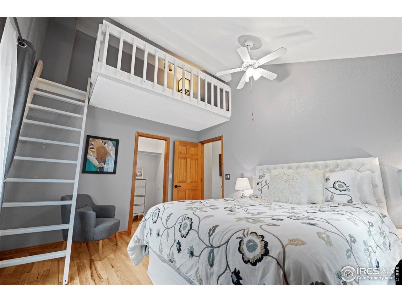 6293 Red Hill Road Boulder, CO 80302 - Photo 22 of 40 a bedroom with a bed and a window