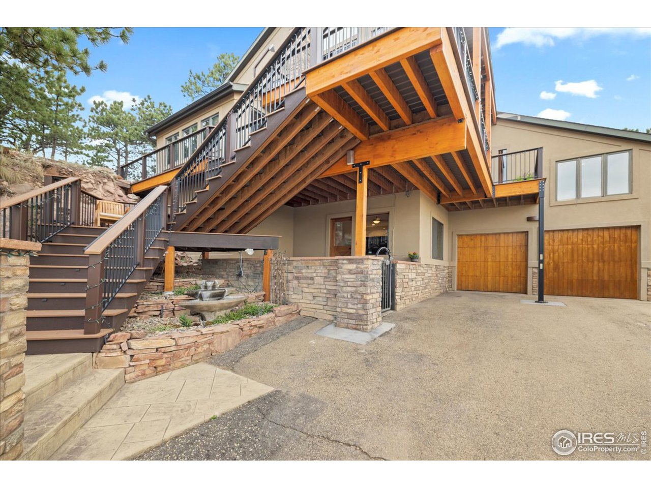 6293 Red Hill Road Boulder, CO 80302 - Photo 31 of 40 a view of a house with a patio