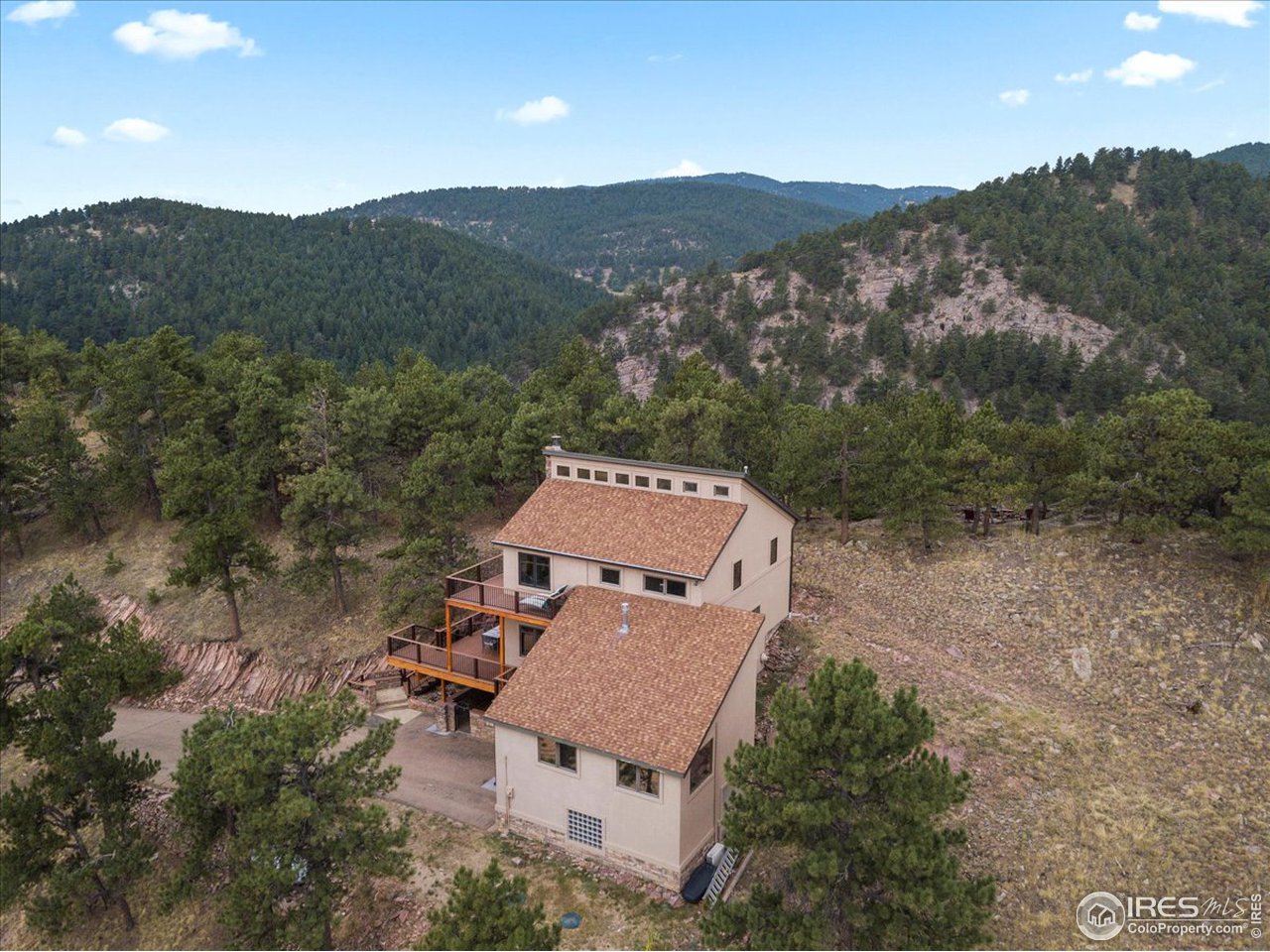 6293 Red Hill Road Boulder, CO 80302 - Photo 34 of 40 an aerial view of a house with a mountain view