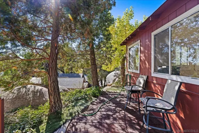 a view of a two chairs in the deck