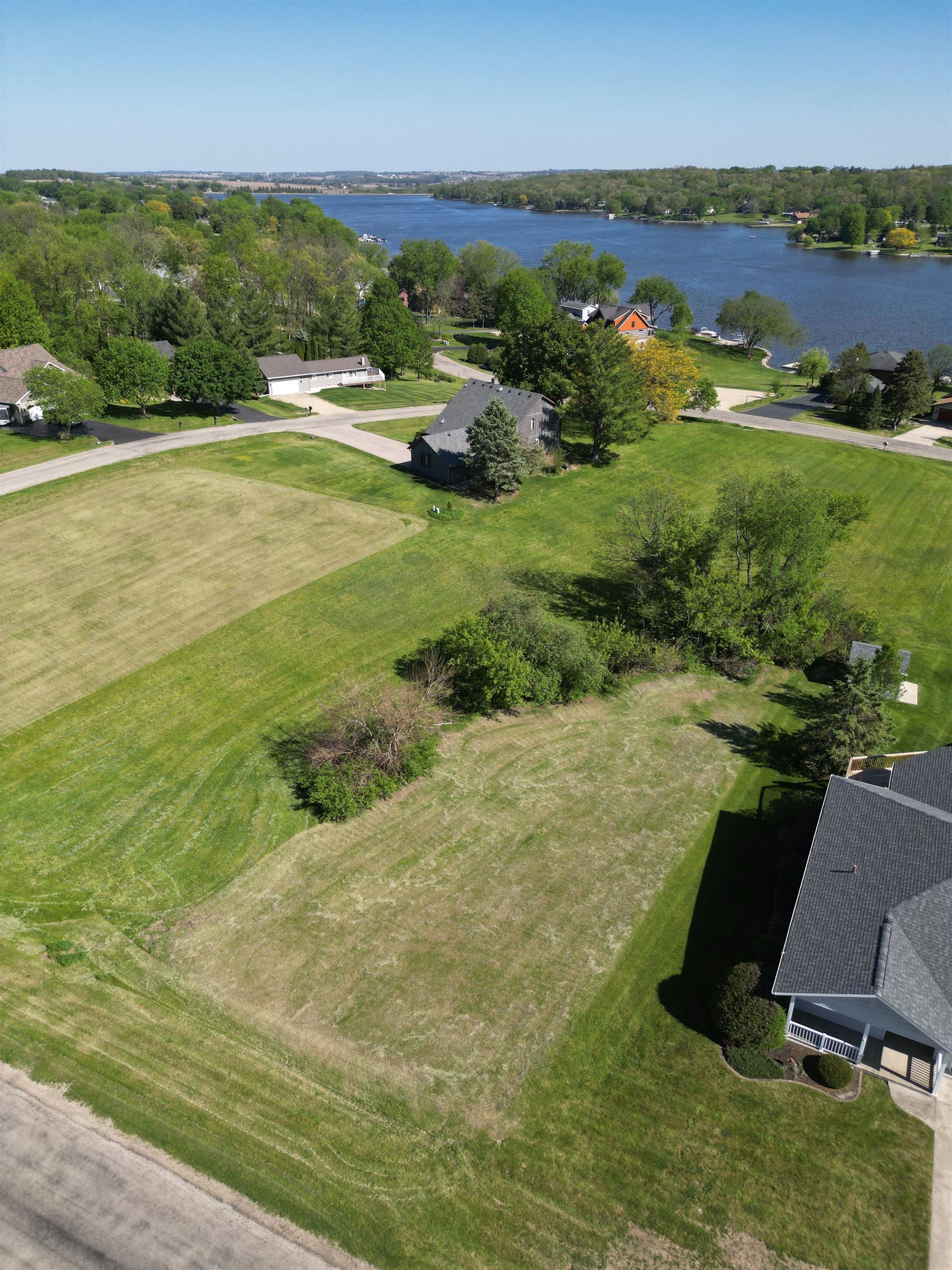 951 Lake Summerset Road Lake Summerset, IL 61019 - Photo 10 of 12 a view of a lake with a yard