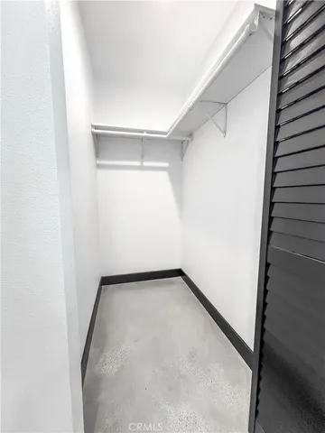 a view of a room with a hallway