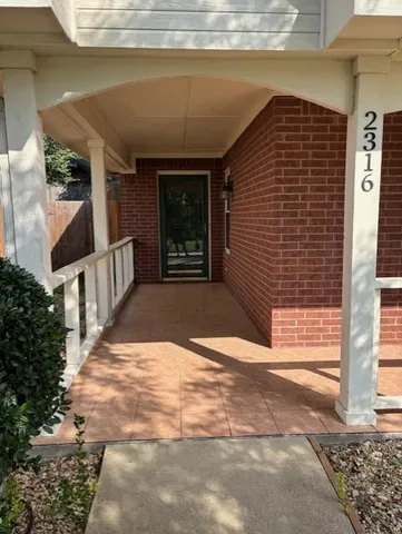 a view of backyard with cabin