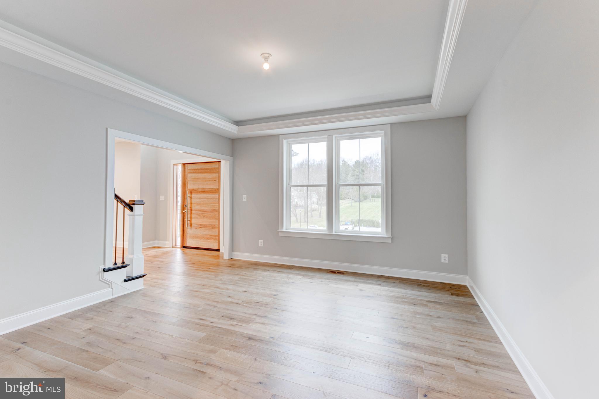3114 Mt Zion Road Upperco, MD 21155 - Photo 13 of 61 an empty room with wooden floor and windows
